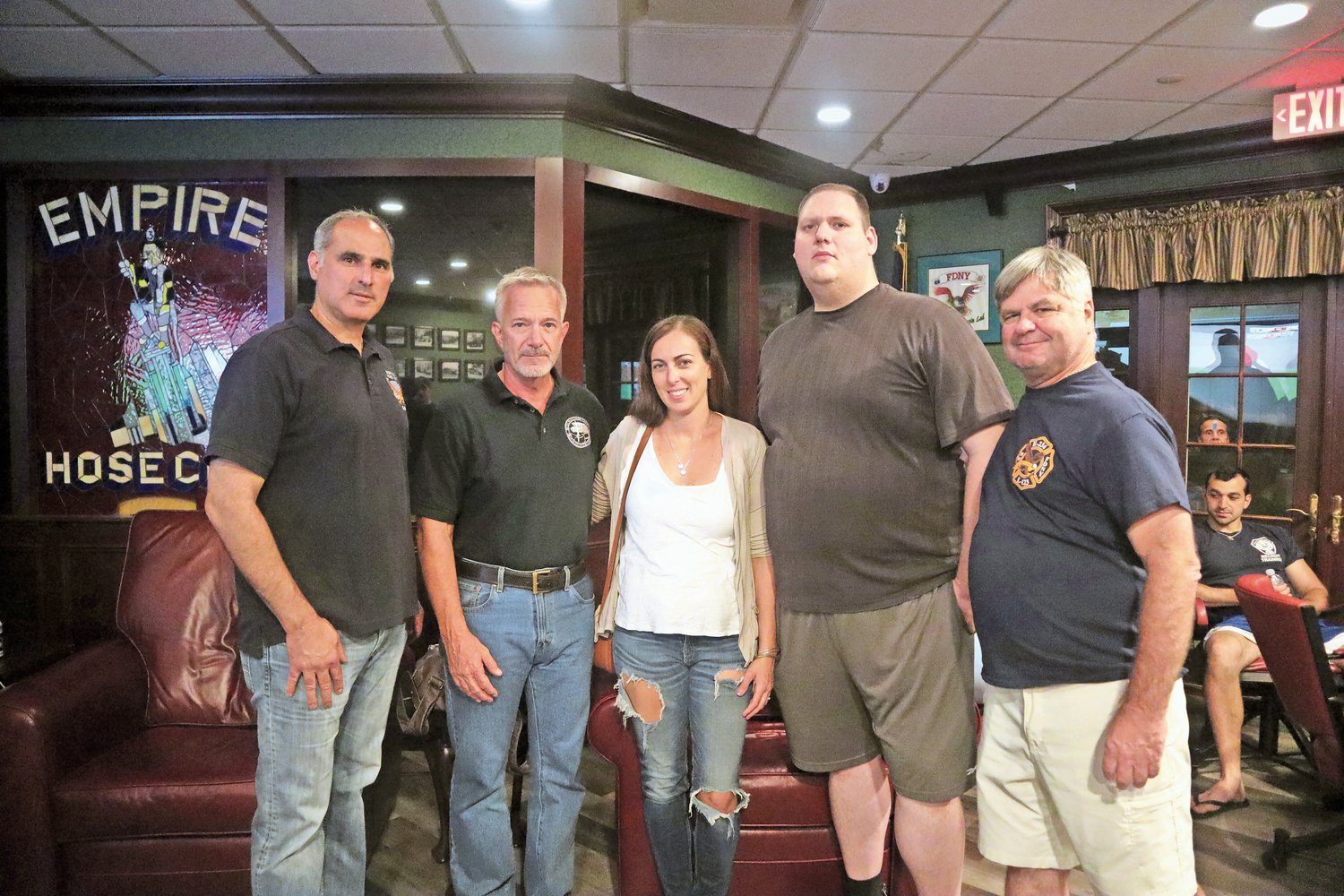 Former MFD Chief Ron Luparello, left, EMT Crystal Desiano, firefighter Tim Reid and former Capt. Kevin Stress, with Gary Harrington, second from left, at the Q & A at Empire Hose Company.