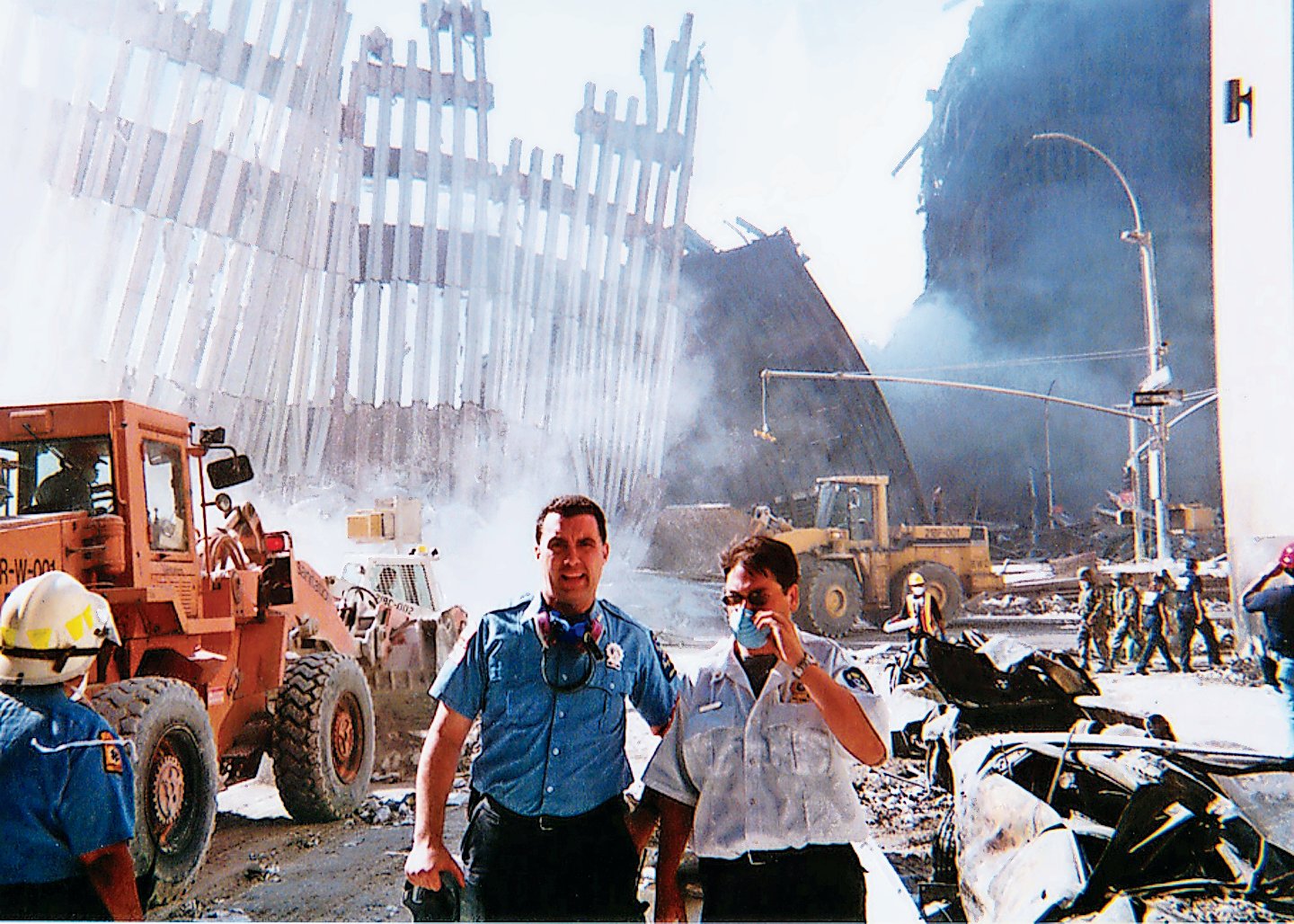 Bellmore-Merrick EMS volunteers Kevin Kelly and Matt Weinick amid the debris at the World Trade Center site in 2001.