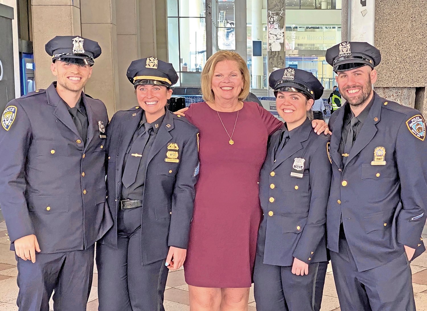 Michael DeMarino, far left, with his siblings Nicole, Morgan and Vincent and their mother, Charlene. All four of the elder Vincent’s children grew up to become first responders.