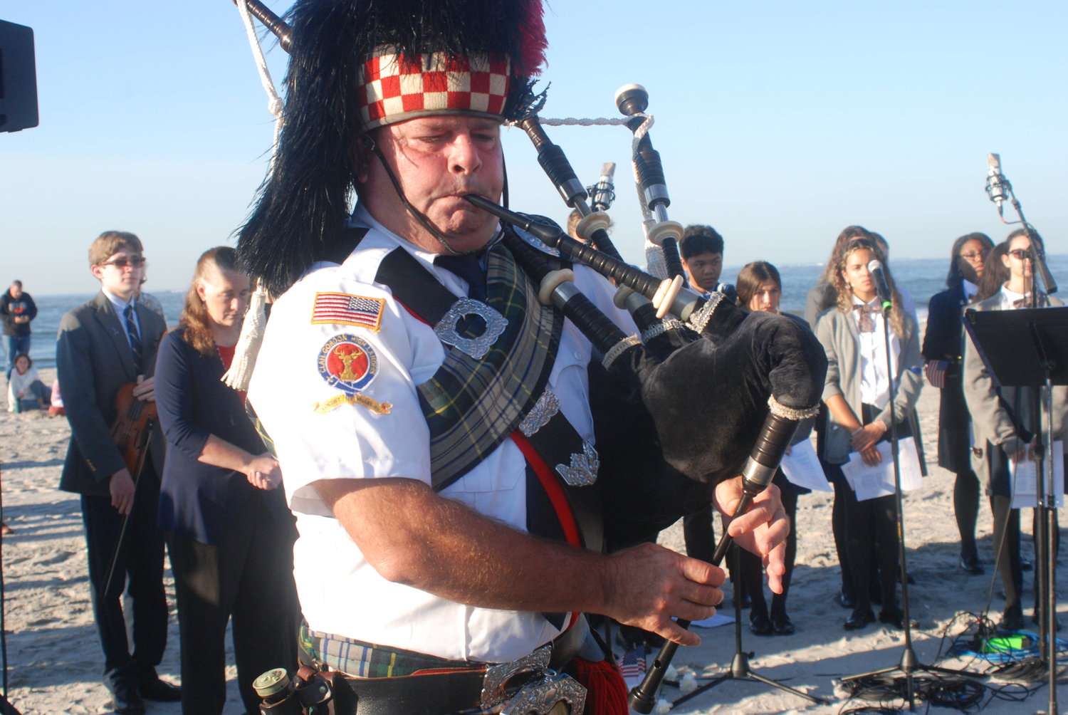 Bagpiper Charlie Armstrong, of the Clan Gordon Highlanders of Locust Valley, led the color guard during the ceremony.