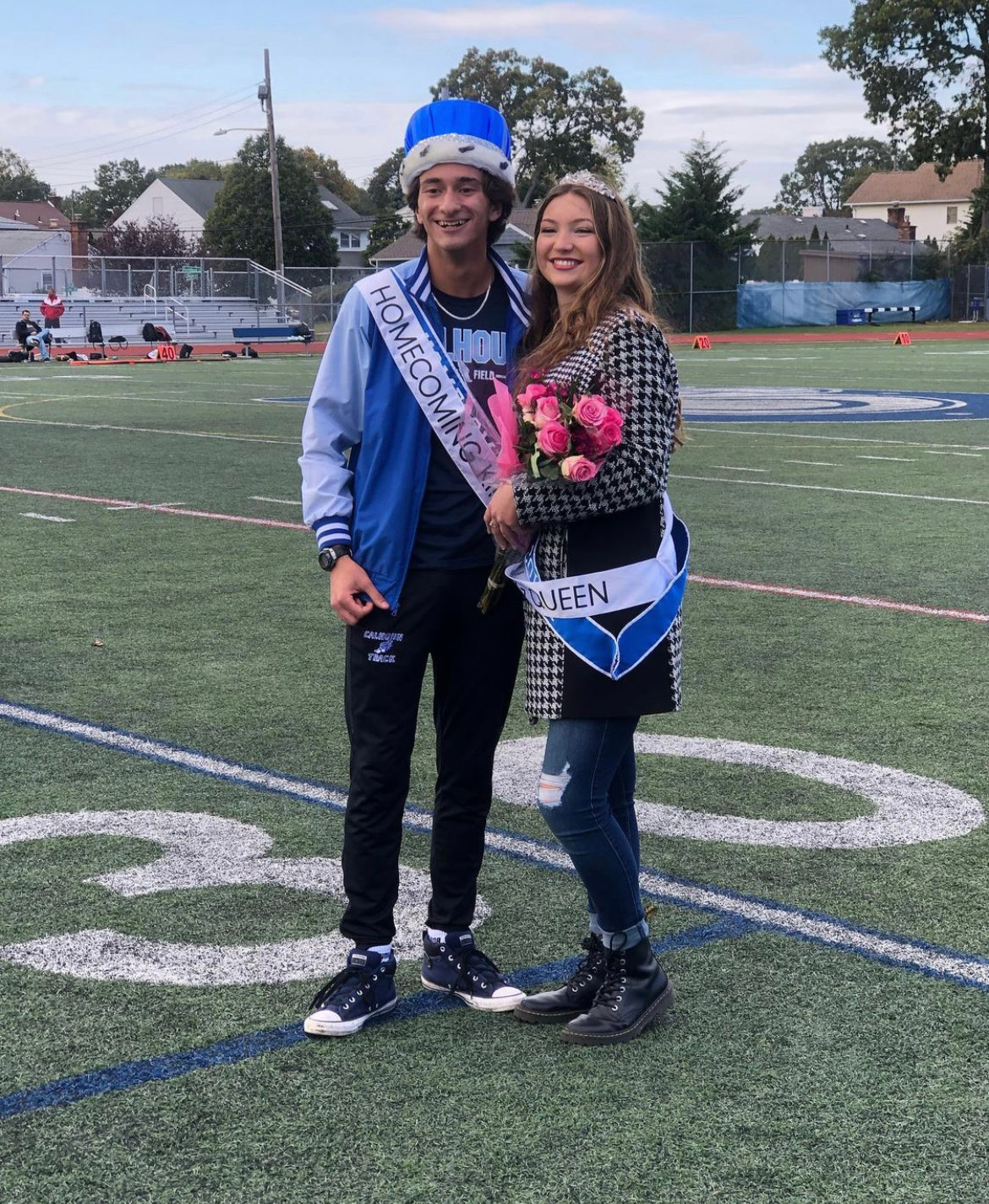 Homecoming king and queen Alex Rosario and Ava Stanek, far left.