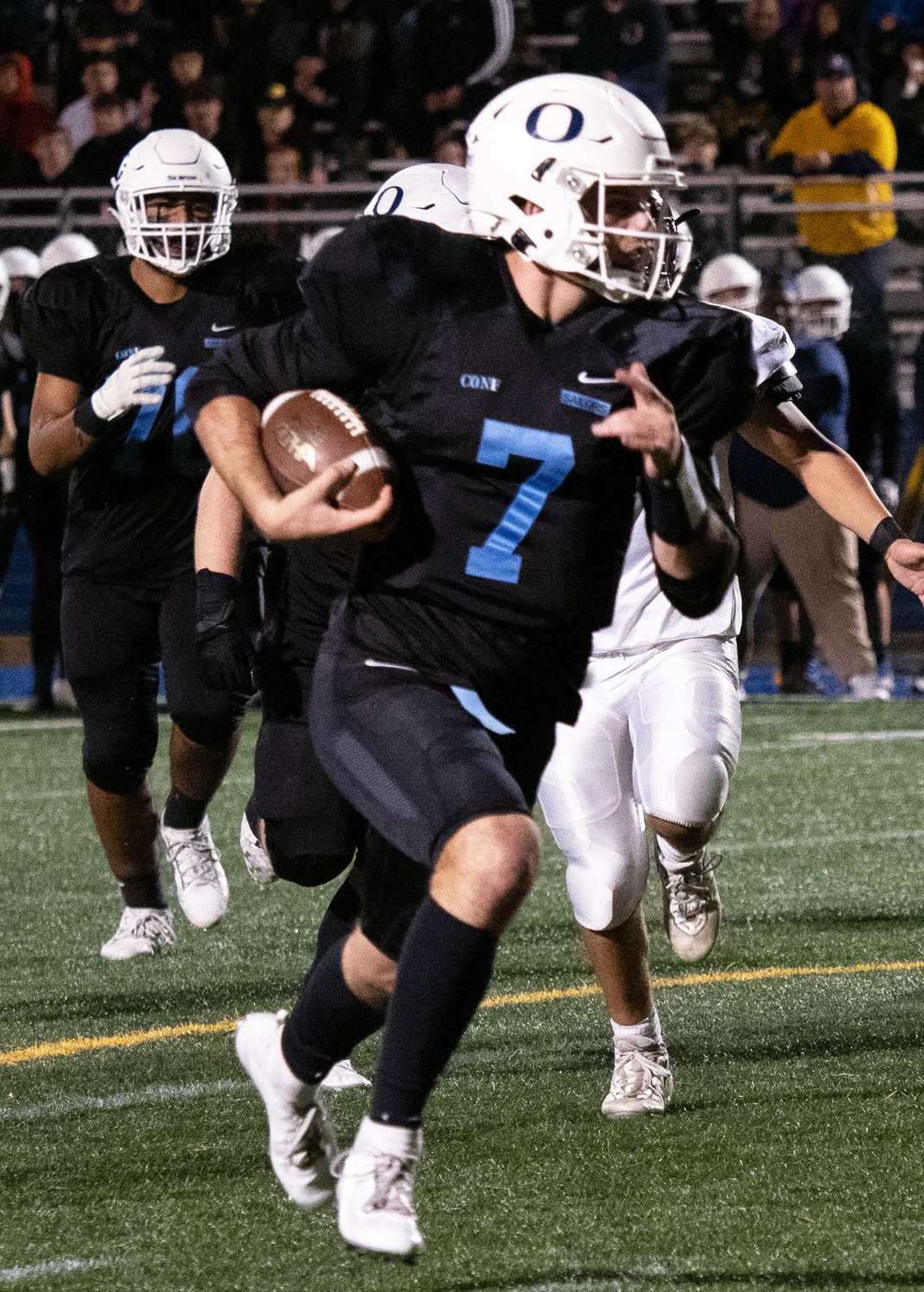 Oceanside quarterback Charlie McKee's legs inflicted plenty of damage last Friday night as the Sailors cruised into the Nassau Conference I title game by beating Syosset.