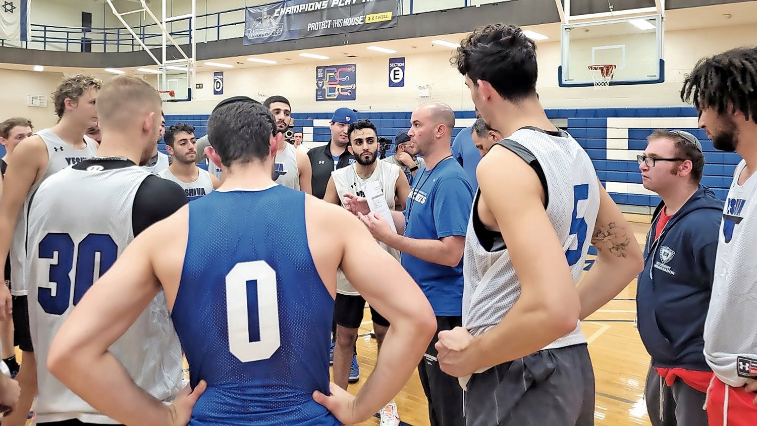 Yeshiva University men’s head basketball coach Elliot Steinmetz addressed his team at an Oct. 15 practice.