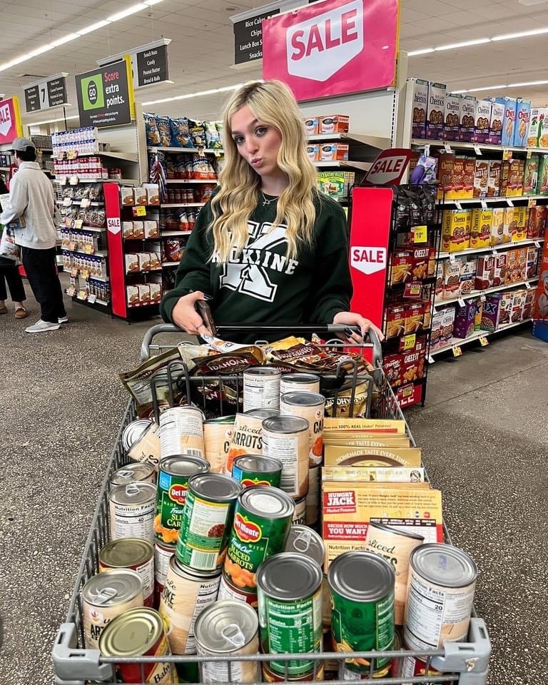 The student government at John F. Kennedy High School in Bellmore recently raised $7,000 over two weeks to purchase food for the Community Cupboard, the Central High School District’s food pantry. Above, government member Savanah LoGuidice checked out at the Stop & Shop in Merrick.
