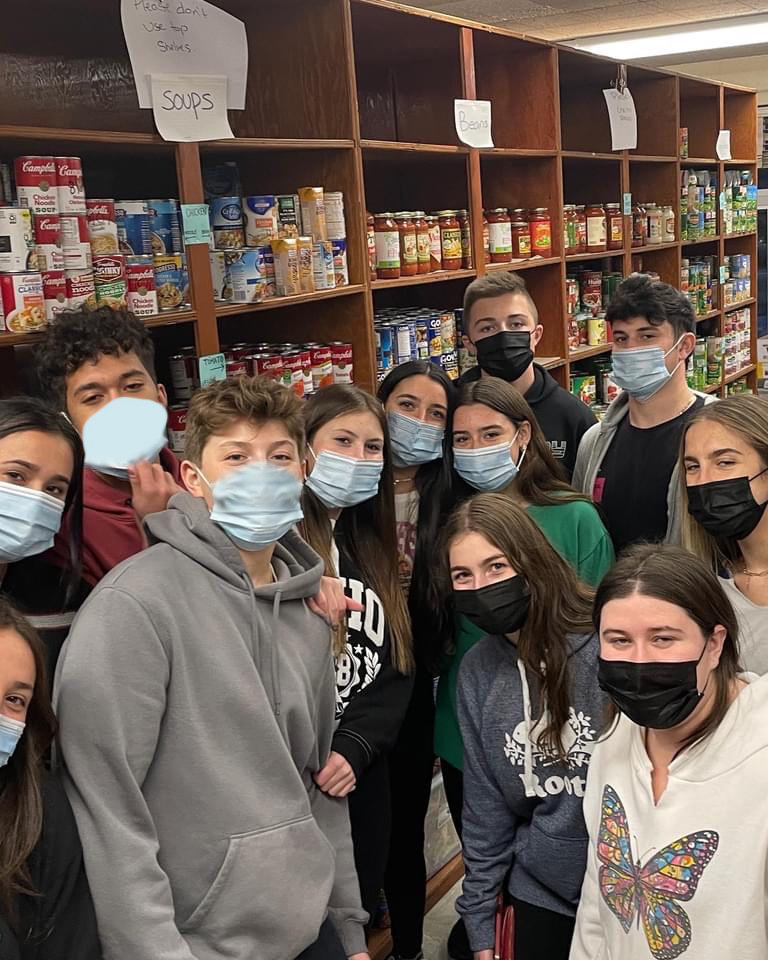 Members of the student government at the Community Cupboard, at Brookside School.