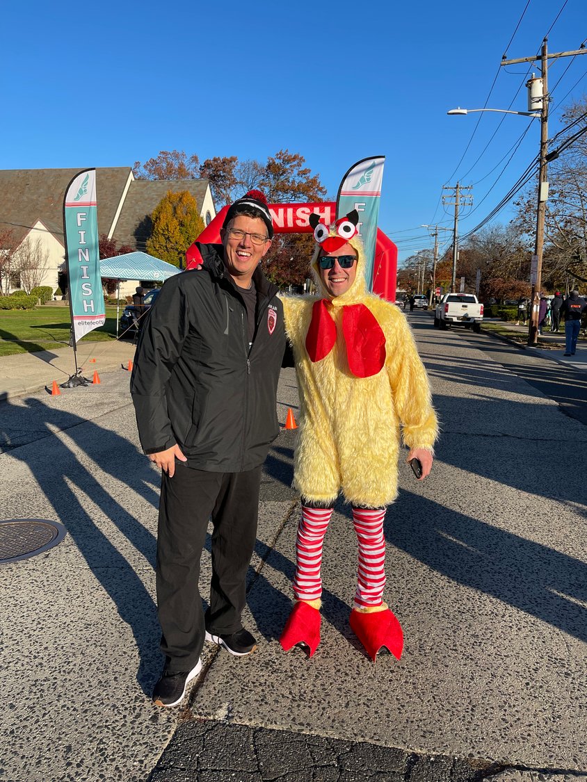 Fr. Joseph Fitzgerald and Fr. James Hansen were happy to dress up and participate in the local race.