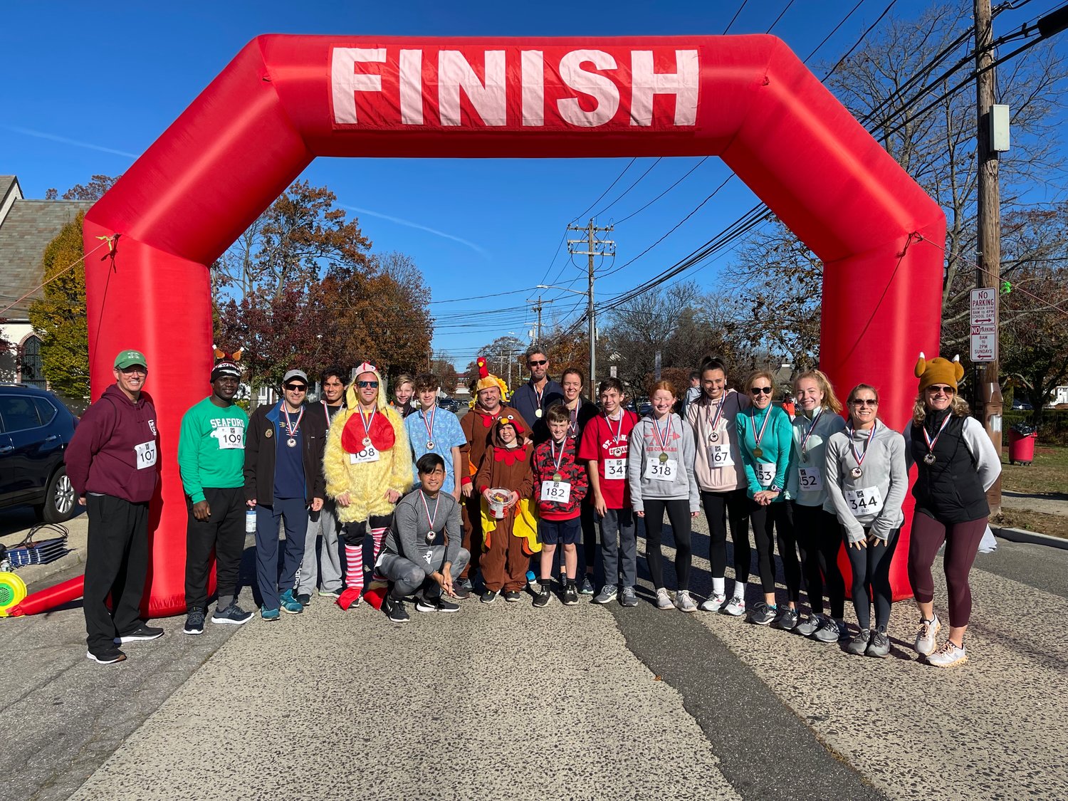Church-goers, priests and community members sported turkey hats and seasonal costumes for the inaugural race held on Nov. 20 in Seaford.