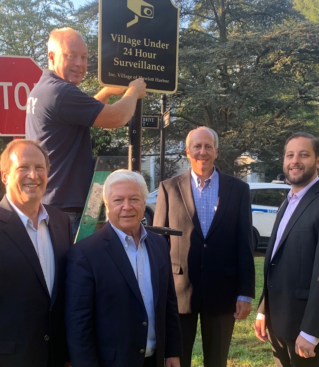 Hewlett Harbor aims to become what officials termed a ‘virtual gated community.’ From left were Trustee Ken Kornblau, security officer Mike Schmitt,  Mayor Mark Weiss and Trustees Tom Cohen and Gil Bruh.