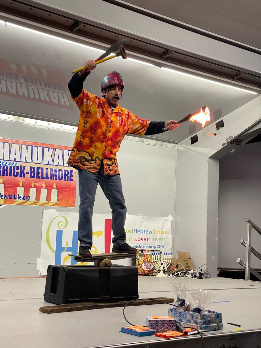 At the end of the evening, Keith the Fire Juggler performed stunts that included juggling knives and torches.