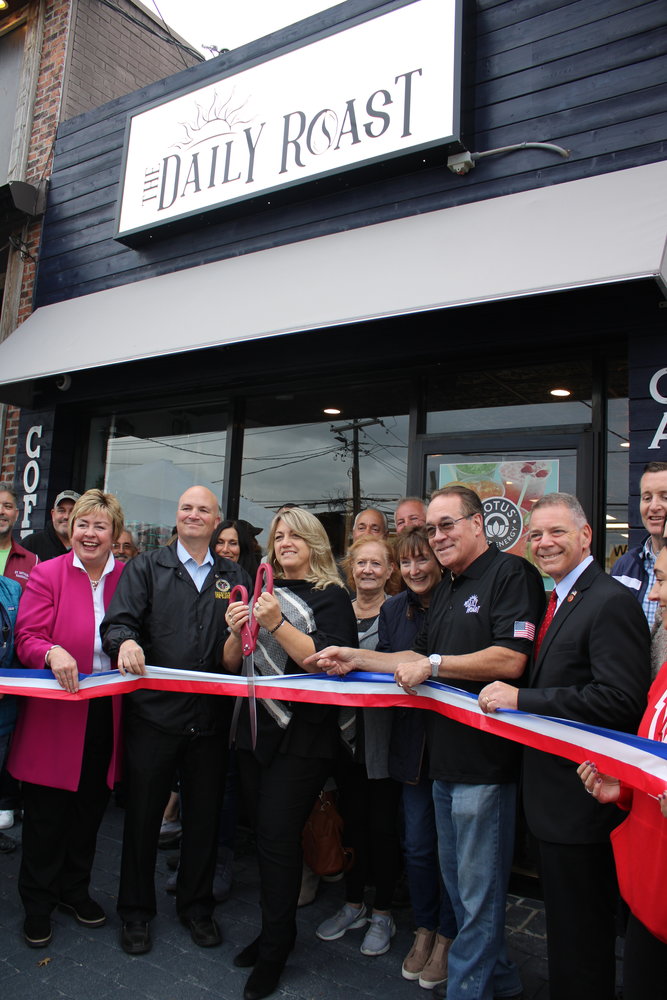The Daily Roast owner Bobby Gayer (second from right) unveiled the Wantagh Avenue cafe with help from the Wantagh Chamber of Commerce and elected officials last month.
