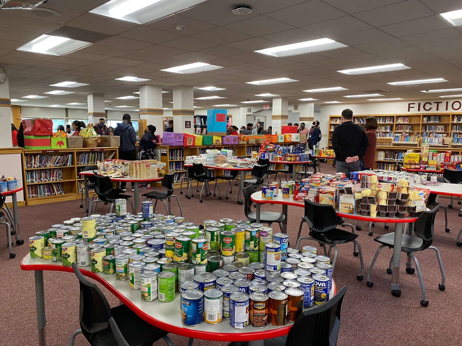 The South High School library was filled with donated food items from the community.