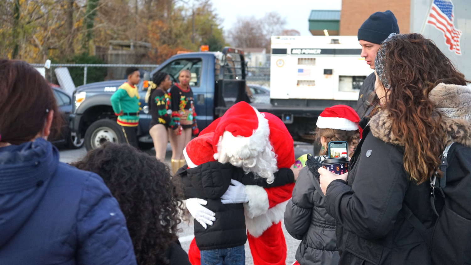 Santa Claus was quite popular at the Chamber of Commerce’s annual tree lighting Dec. 5 at the Baldwin Historical Society.