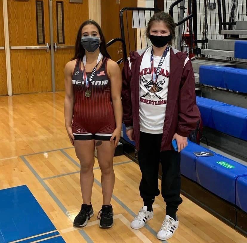 Yianna Foufas and Talia Robles, sophomores at Wellington C. Mepham High School in Bellmore, competed in an all-girls wrestling tournament in Copiague earlier this month.