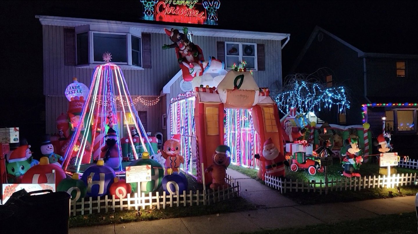 The house on Woodland Avenue has 16 or so blow-ups and thousands of lights.