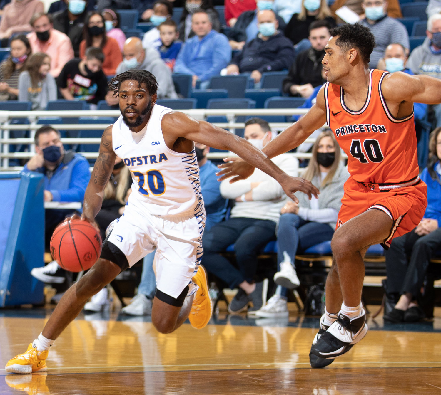 Graduate student Jalen Ray, left, entered the season ranked 17th on Hofstra's all-time scoring list with 1,334 career points.