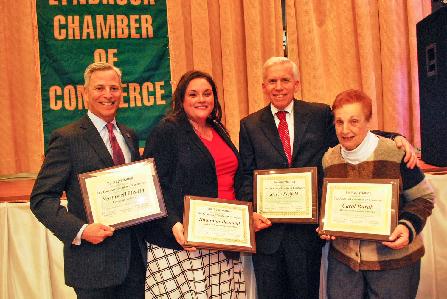 The Lynbrook Chamber Commerce has moved its Evening of Excellence from Jan. 15 to June 4. Above, 2020 honorees, from left, Ira Nash, Shannan Pearsall, Steve Freifeld and Carol Burak.