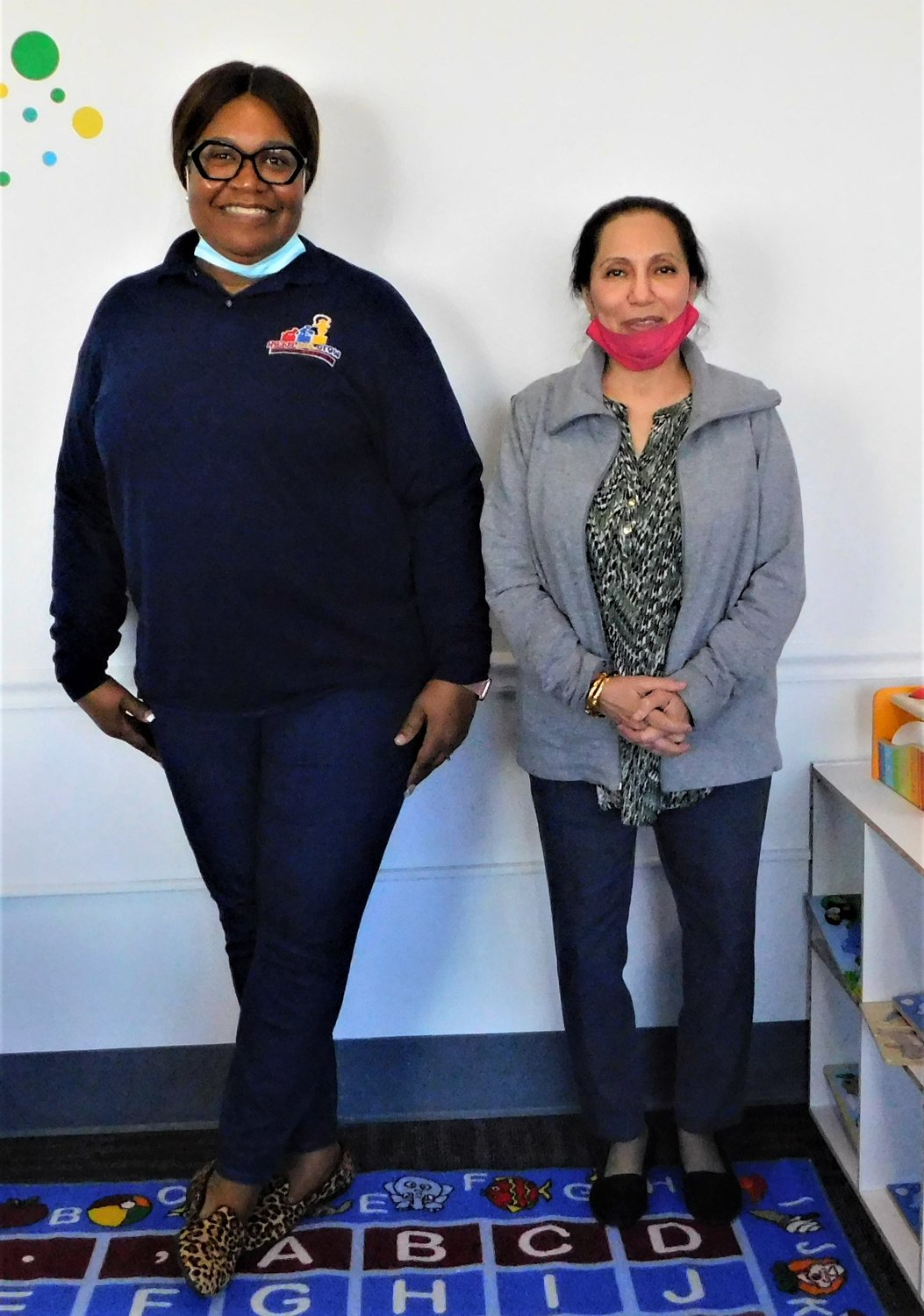 Naheed Khan, right, the director of Ready Set Grow Learning Academy, co-owned by Chelisa Harris, left, presented experienced-based reasons for more government support of child care providers. The business is in the Freeport Armory building.