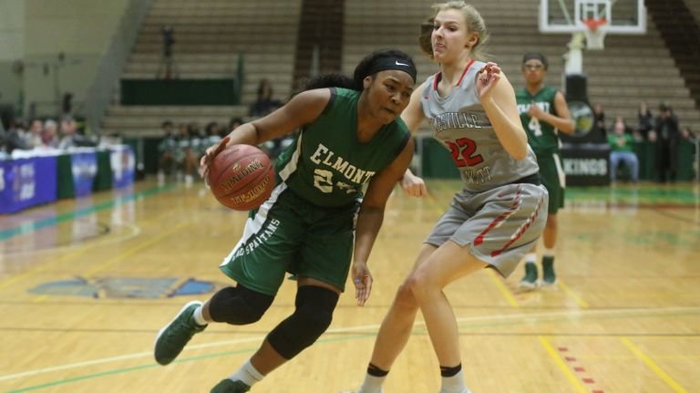 Elmont's Arielle Pierre driving against a player from Long Beach during a 2015 game.