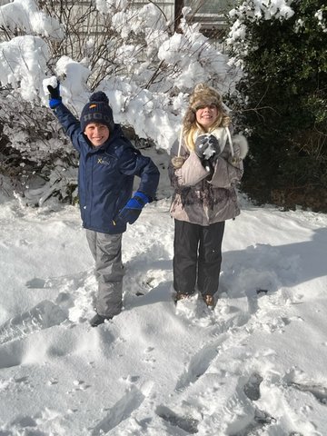 Twins Ryan and Isabella Ehmsen, 10, checked out the snow.