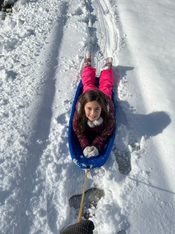 After the first snowfall of 2022, Lauren Bonura, 7, broke out her sled.