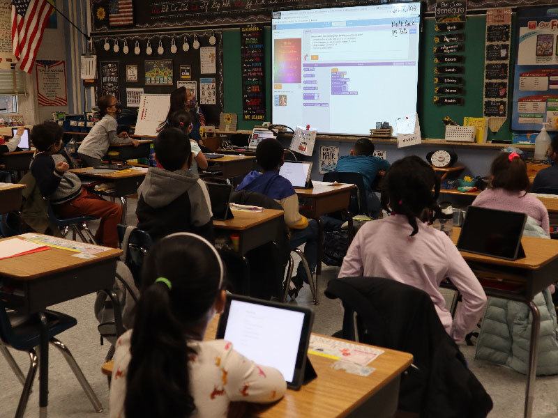 Shaw Avenue teacher, Jeanine Lichter, walked her second grade class through a coding challenge.