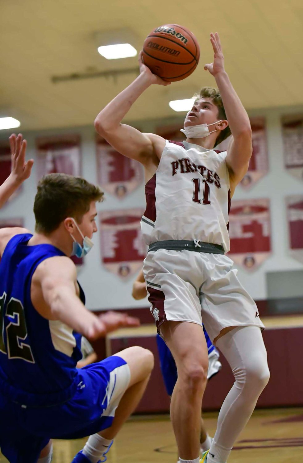 Mepham senior Robert Tansey, right poured in a game-high 27 points on Jan. 6 but the Pirates fell short against Long Beach after a strong first half.