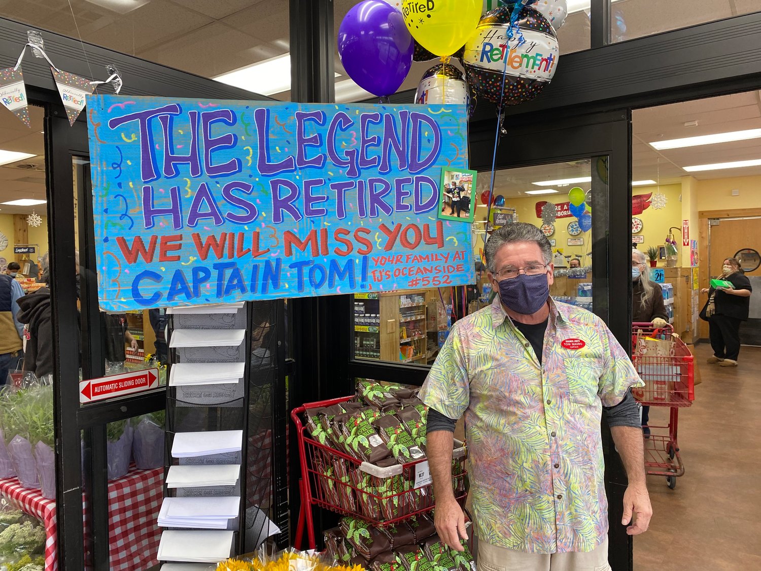 Tom Mauro, manager at Trader Joe's for the past six years, was celebrated by his employees during his last day last Wednesday.