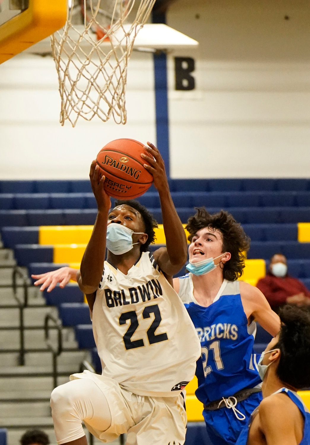 Senior Gerrard Beaubrun had 10 points, 7 rebounds and 4 assists as the Bruins beat Bishop Loughlin, 71-68, as part of the Gary Charles Tip of the Hat Classic.