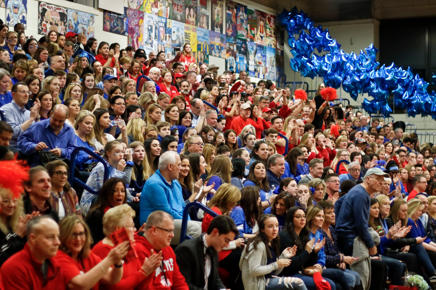 After parents and students expressed disappointment over a tentative plan for the annual Red and Blue competition in March, school officials said they were still mulling options on how to ensure safety while keeping the tradition alive, which includes coming up with a policy on spectators. At left, hundreds of people attended a past event.