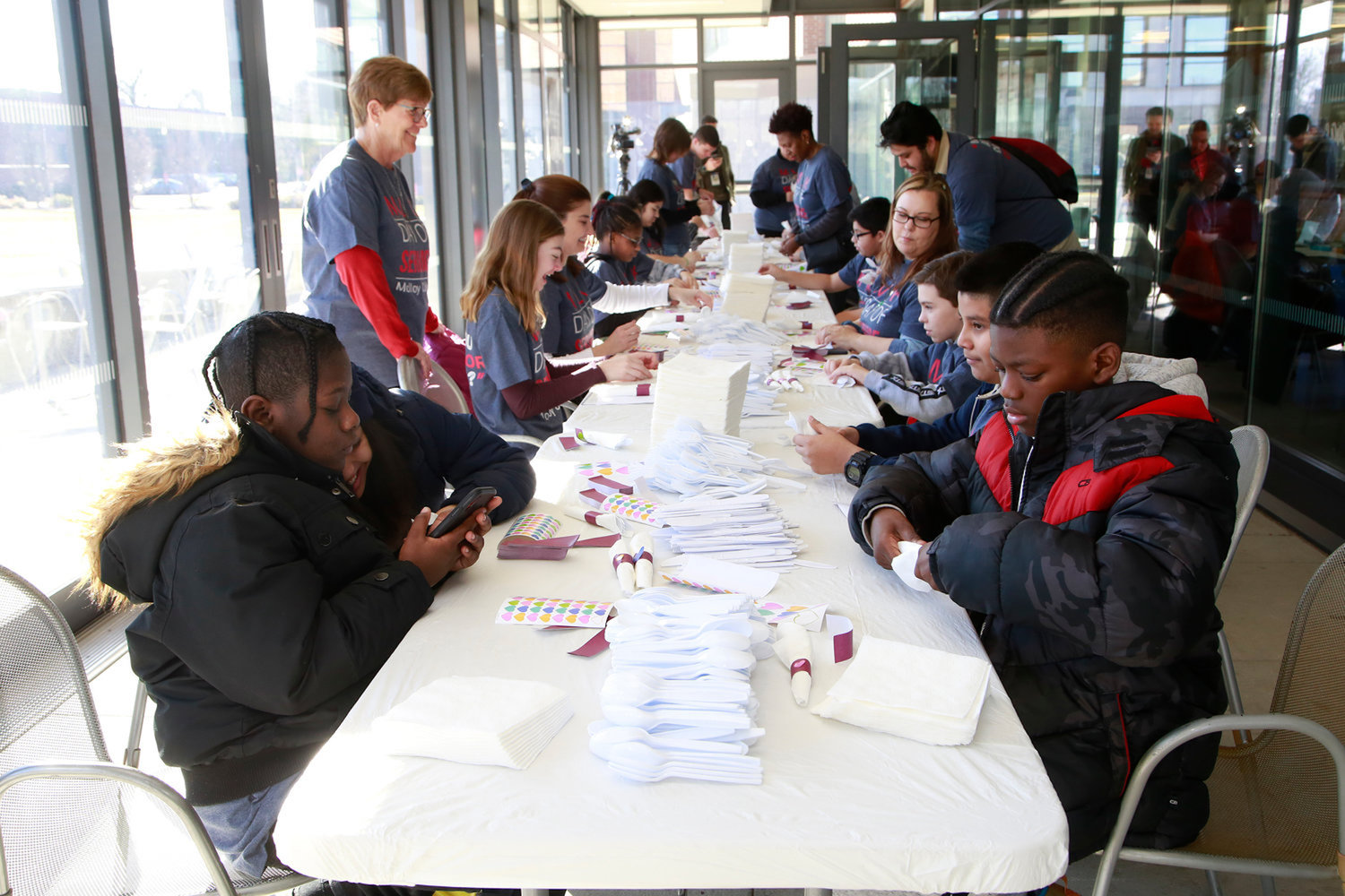 Molloy College's Martin Luther King Jr. Day of Service had to go virtual on Monday. At last year's event, Sister Diane Capuano spoke to students as they prepared place settings for the Mary Brennan INN in Hempstead.