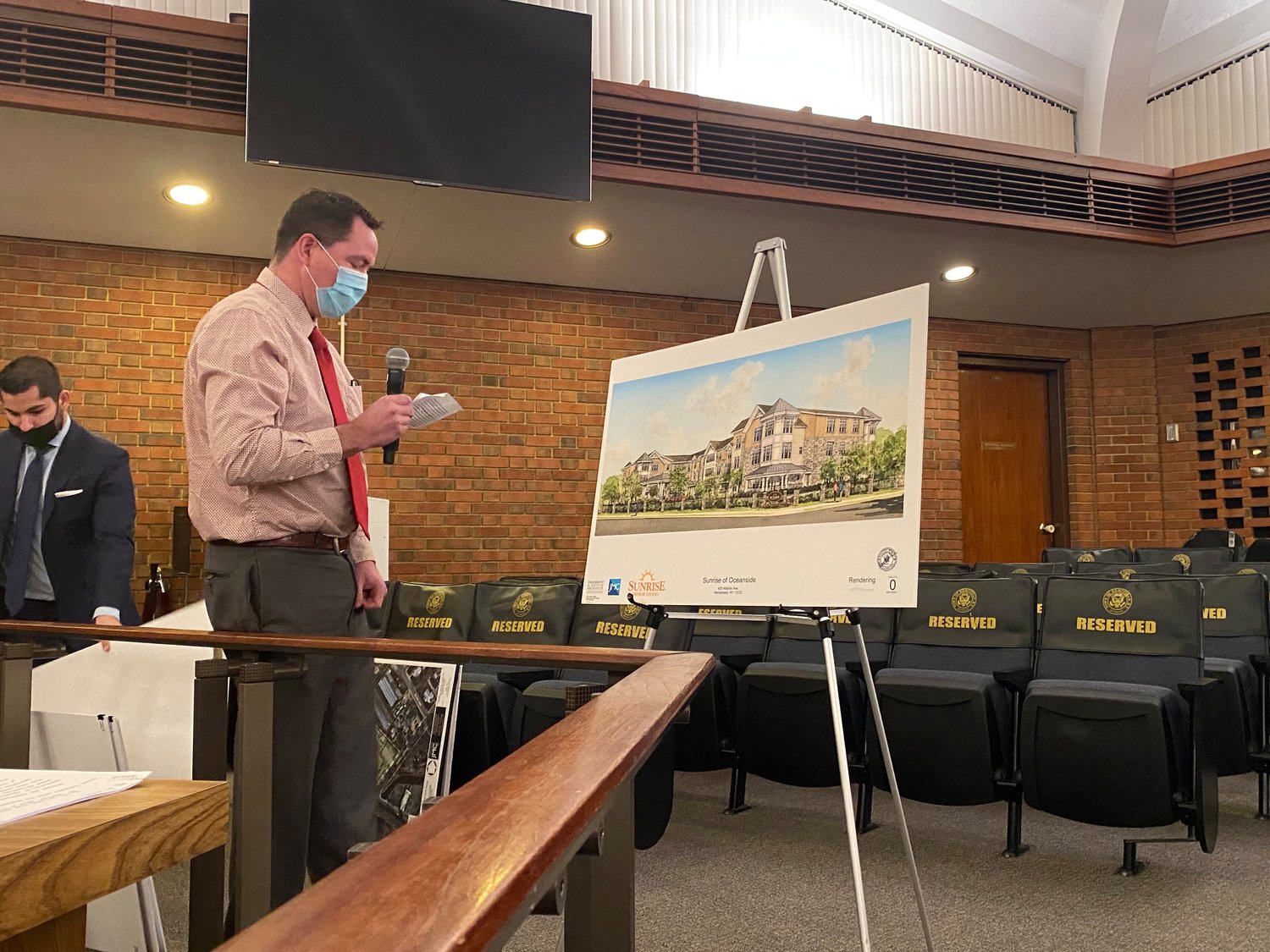 Andy English, project manager at ECA Architects, presented mock-ups of the proposed Sunrise Building.