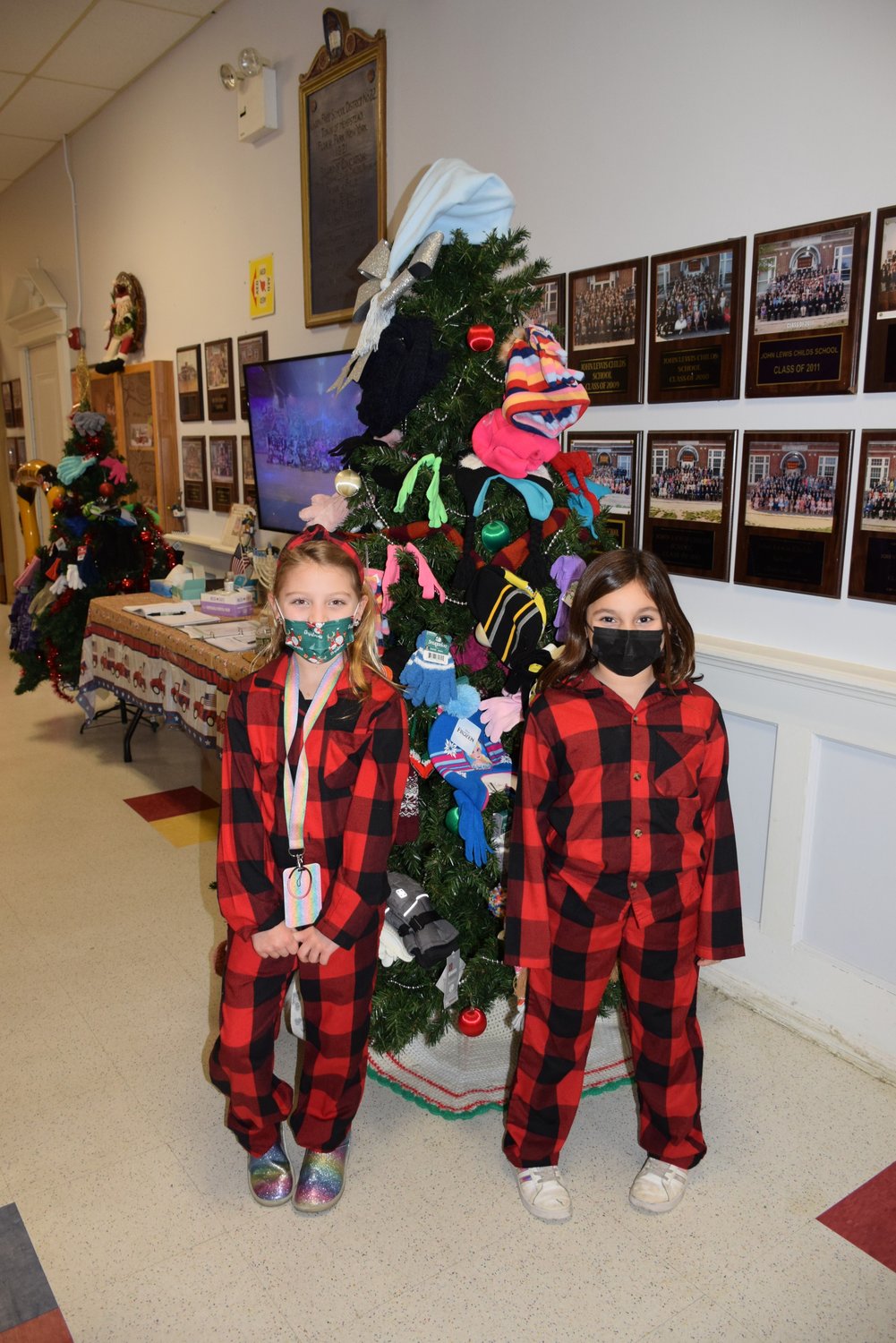Students and staff at John Lewis Childs School in Floral Park decorated two ‘Mitten Trees’ throughout December to help local residents in need.