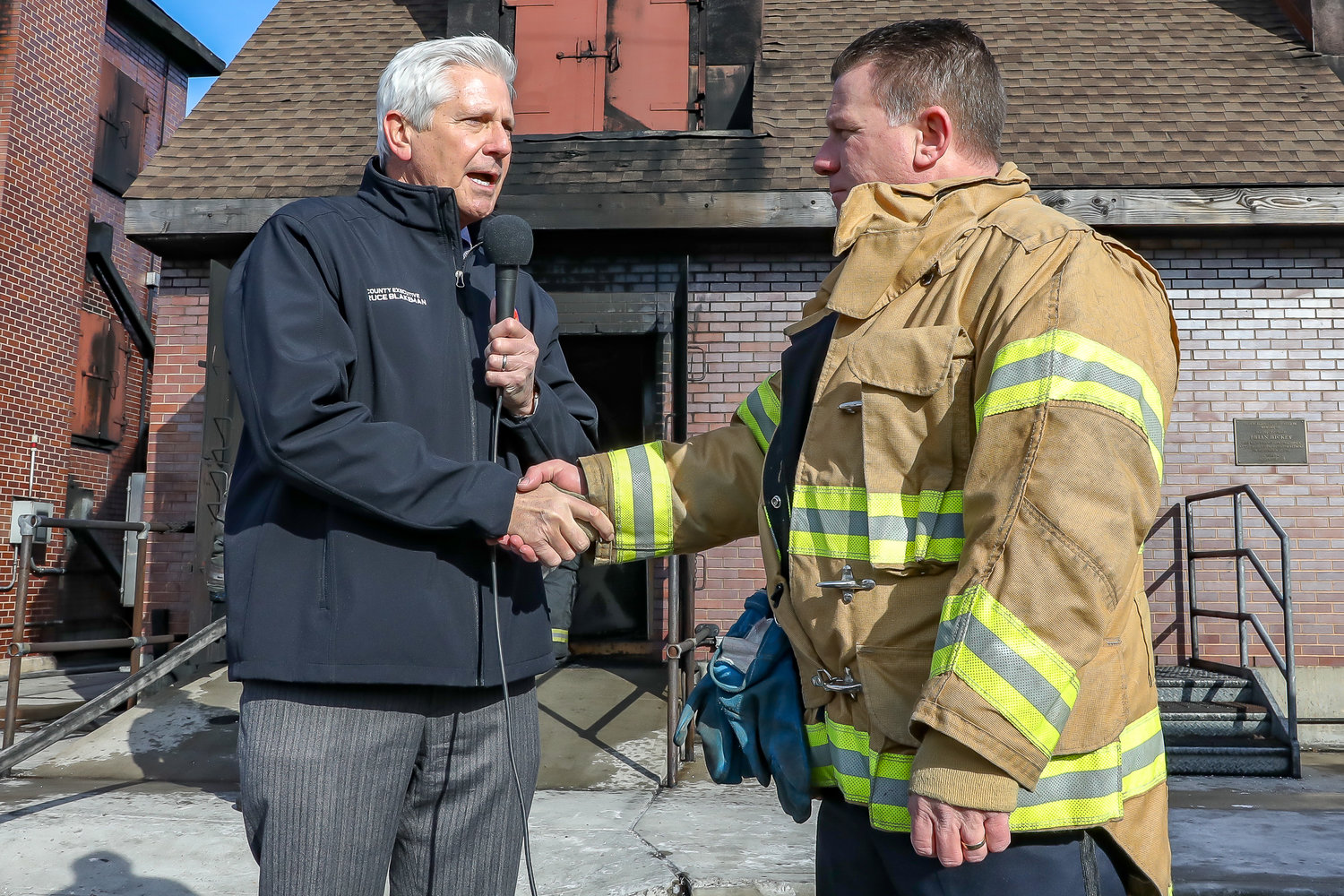 County Executive Bruce Blakeman shared a mic with Nassau County Chief Fire Marshal Michael Uttaro during the fire safety demonstration.