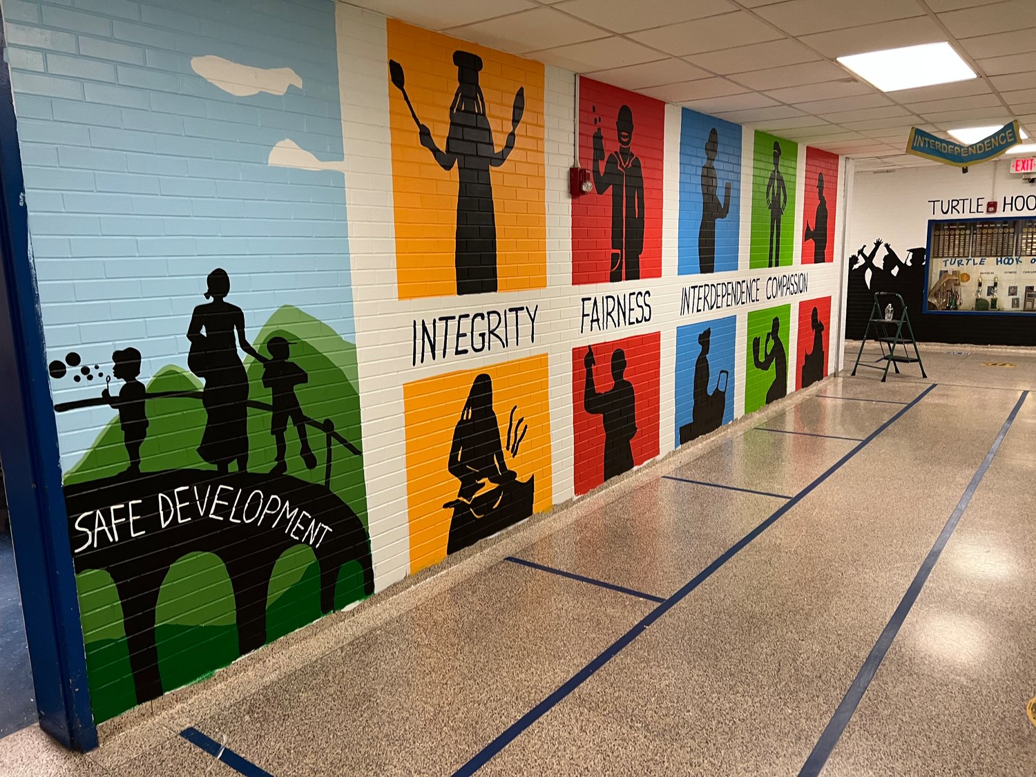 Strong values and symbolic shapes now speak from the walls of Turtle Hook Middle School.