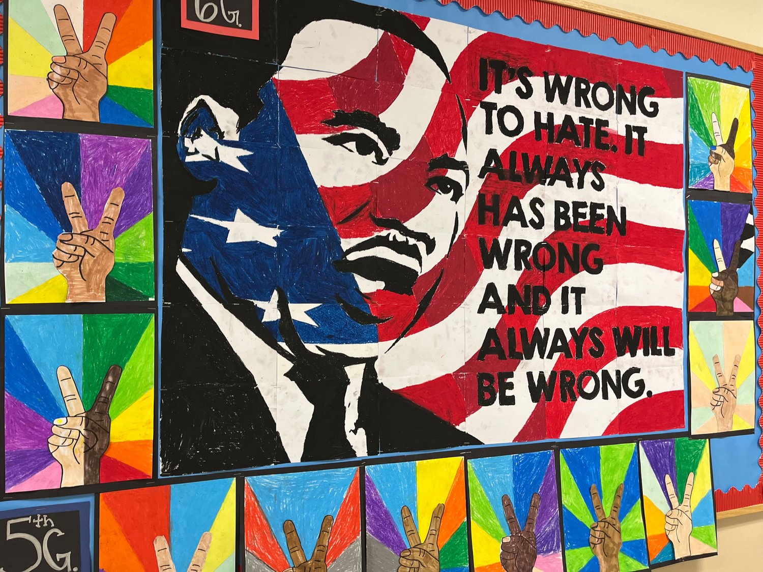 Dr. Martin Luther King, Jr. Mural with peace signs created by William L. Buck students.