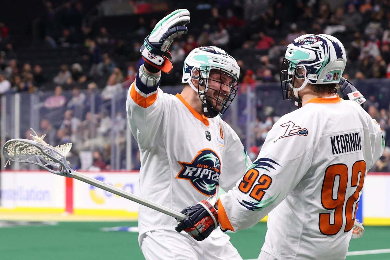 Connor Kearnan, right, celebrated with Dan MacRae after one of Kearnan's four goals in the Riptide's 13-12 win at Philadelphia on Sunday afternoon.