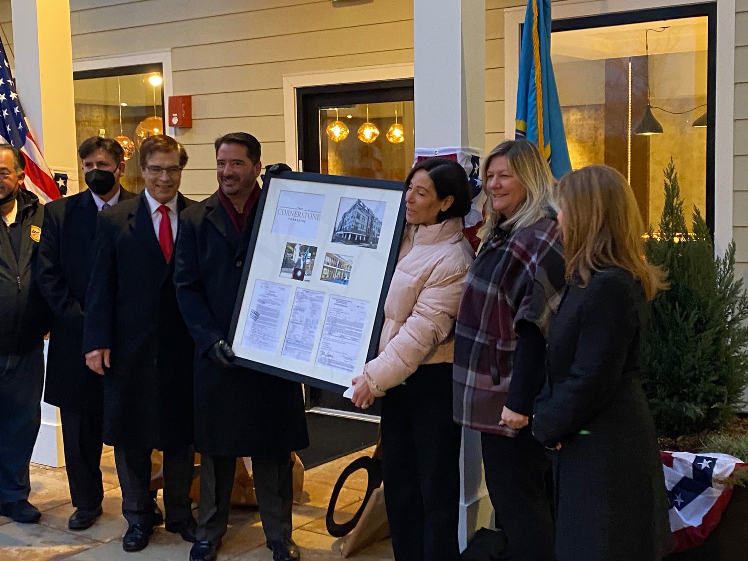 Beach and the village board presented Terwilliger and Bartone with a framed photo of the Cornerstone, the demolition permit for the Capri Lynbrook Motor Inn and the certificate of operation.