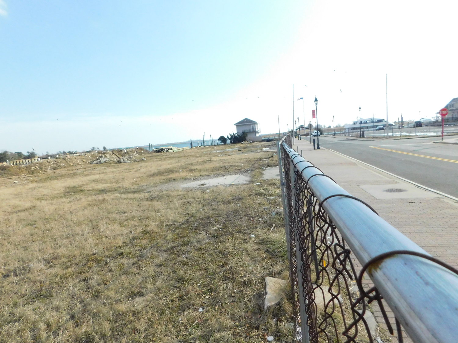 The long empty space where the proposed hotel would rise was once the site of The Schooner restaurant and the Hunter Pointe Marina.