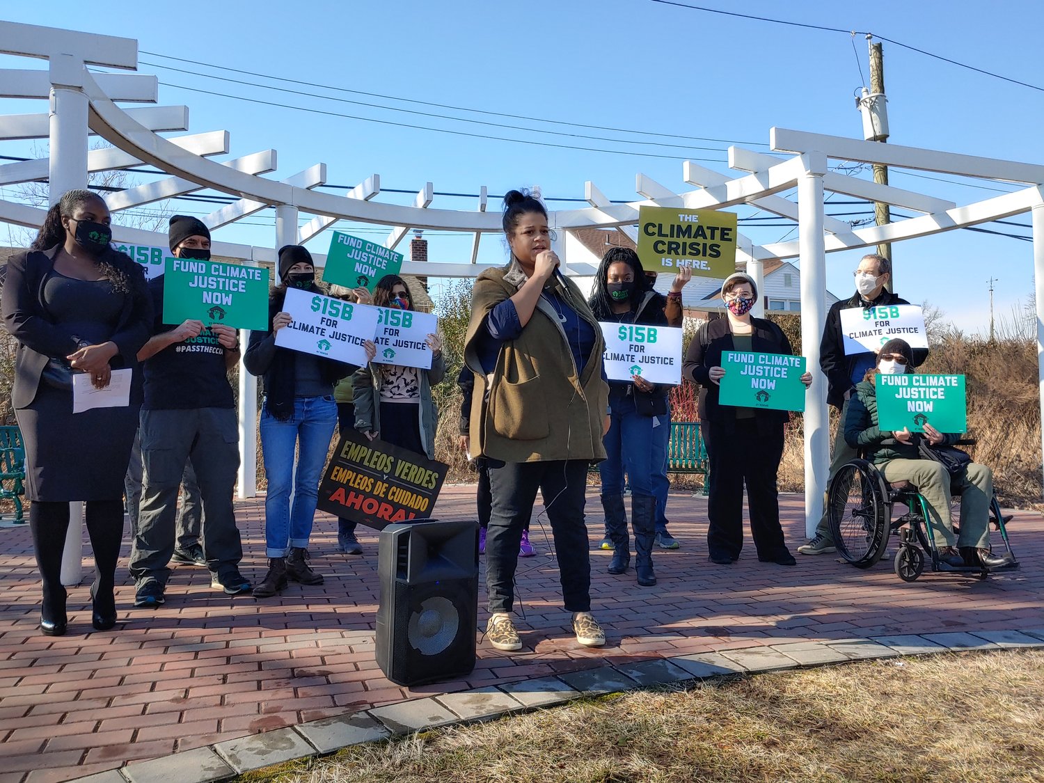 Activists from NY Renews, joined by State Assemblywoman Michaelle Solages, above, rallied in Mill Brook Park for major budget spending for climate action.