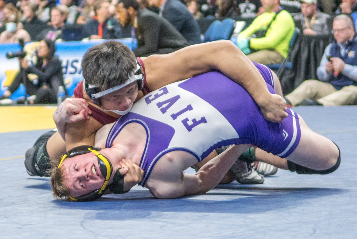 Clarke's Jordan Soriano, top, defeated Caleb Sweet from South Seneca, by a 10-1 major decision last Saturday evening to win the NYS Division 2 138-pound title.