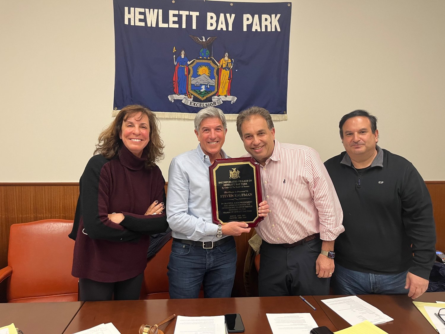 After 30 years in Hewlett Bay Park — including more than half of that as village mayor — Steven Kaufman has stepped down. Joining him at his final village meeting March 3 were, from left, Trustee Gail Rubel, newly appointed Mayor Alex Salomon, and Trustee Antonio Oliviero.