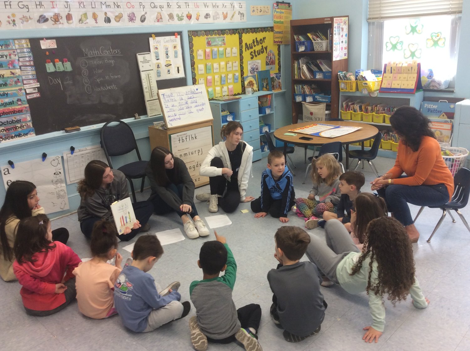 High School students spoke to kindergarten students on the rules of philosophy.