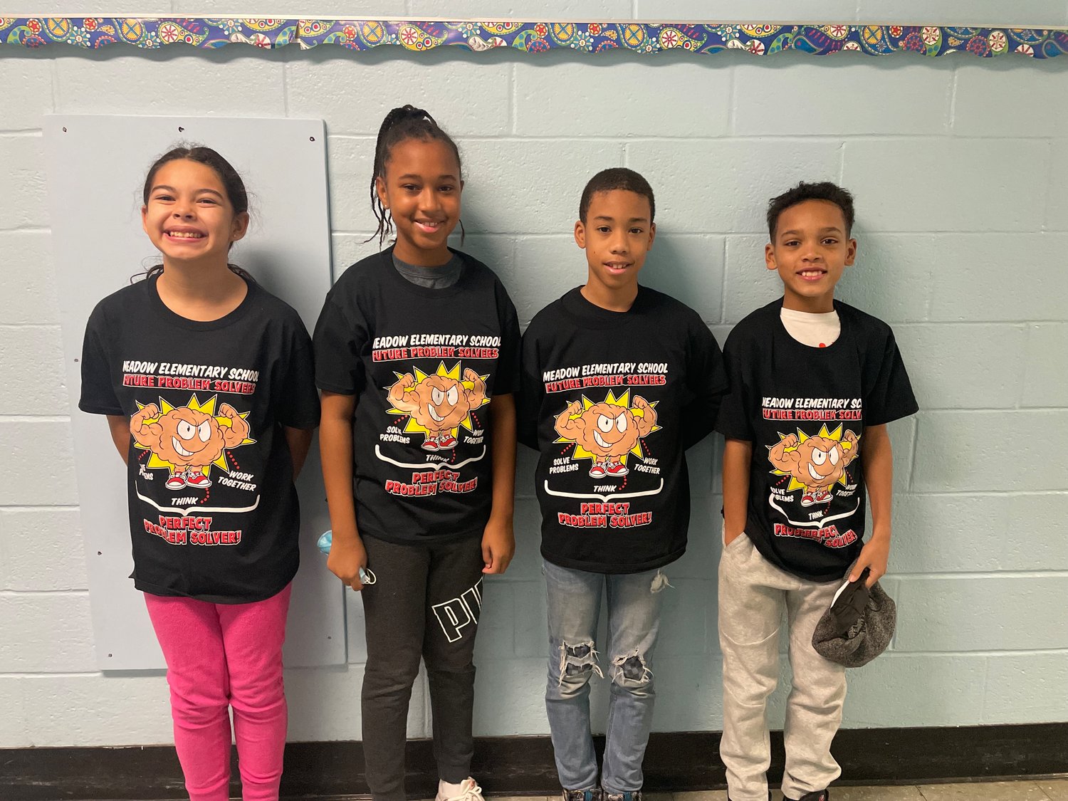 Wild Brains team is represented by students Olivia, Kristen, Mekhi, Elijah, who placed first for their Action Place skit presentation.