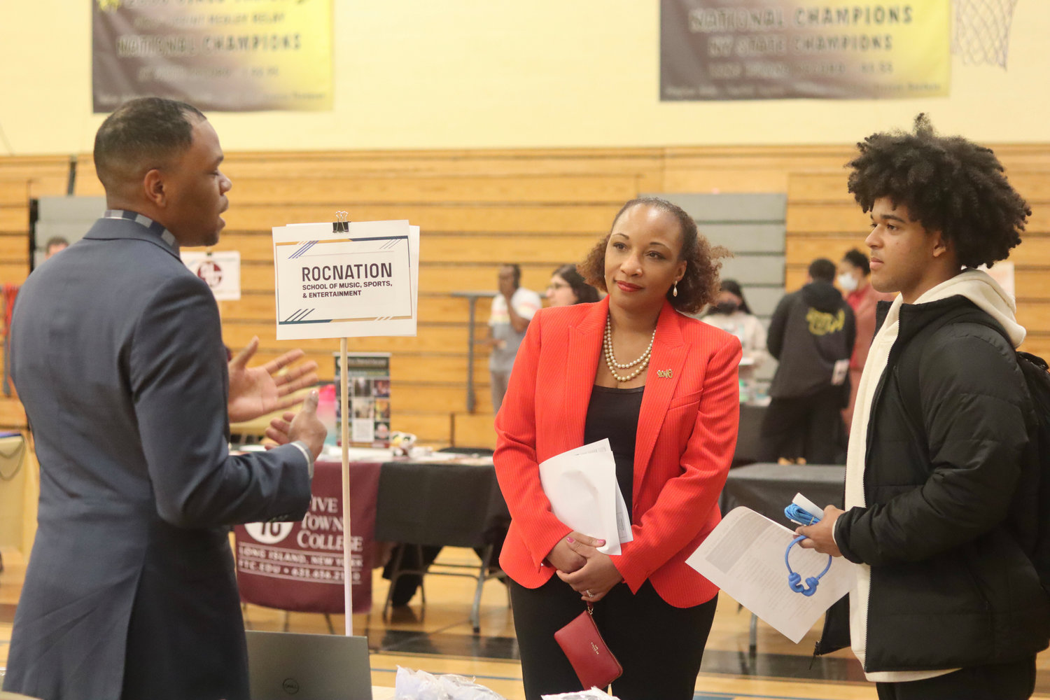 Dr. Monique Darrisaw-Akil, center, spoke with students at the March 31 career fair, which was sponsored by the New York State My Brother’s Keeper organization.