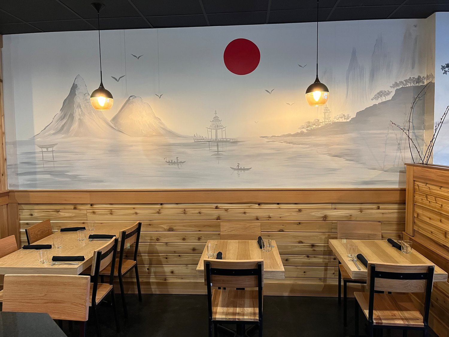 The mural at Danny’s Izakaya, which takes up an entire wall, was painted by @arlenemurals.