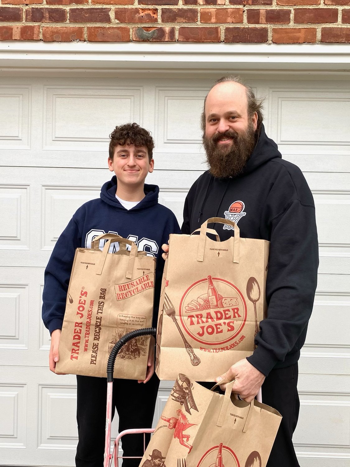 Maxwell and mark Greenberg delivered food to families in Oceanside for Passover.