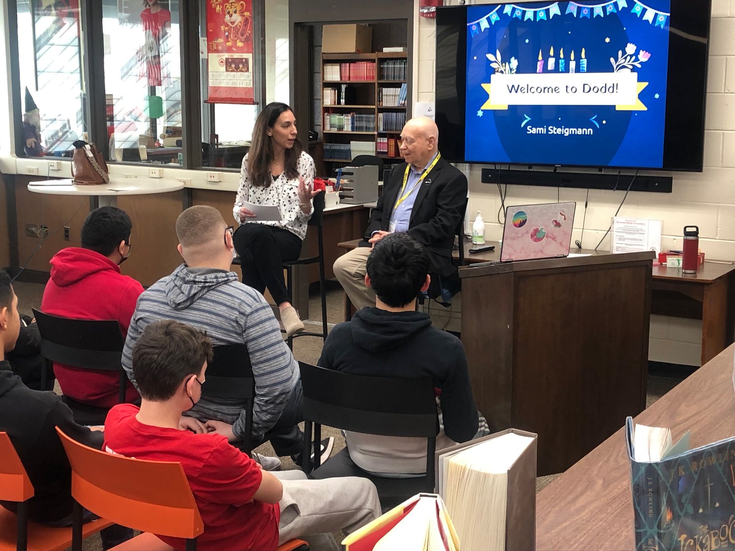 J.W. Dodd Middle School eighth grade students with Holocaust Survivor Sami Steigmann, who spoke to the students about his experience and the importance of standing up against injustice and prejudice.