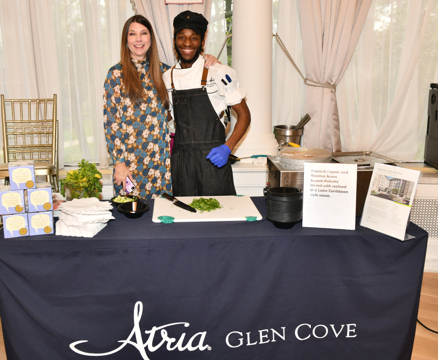 Diane Ziemes, above, with Chef Peter Bazelis of Glen Cove Atria, served up delicious squash polenta and seafood.