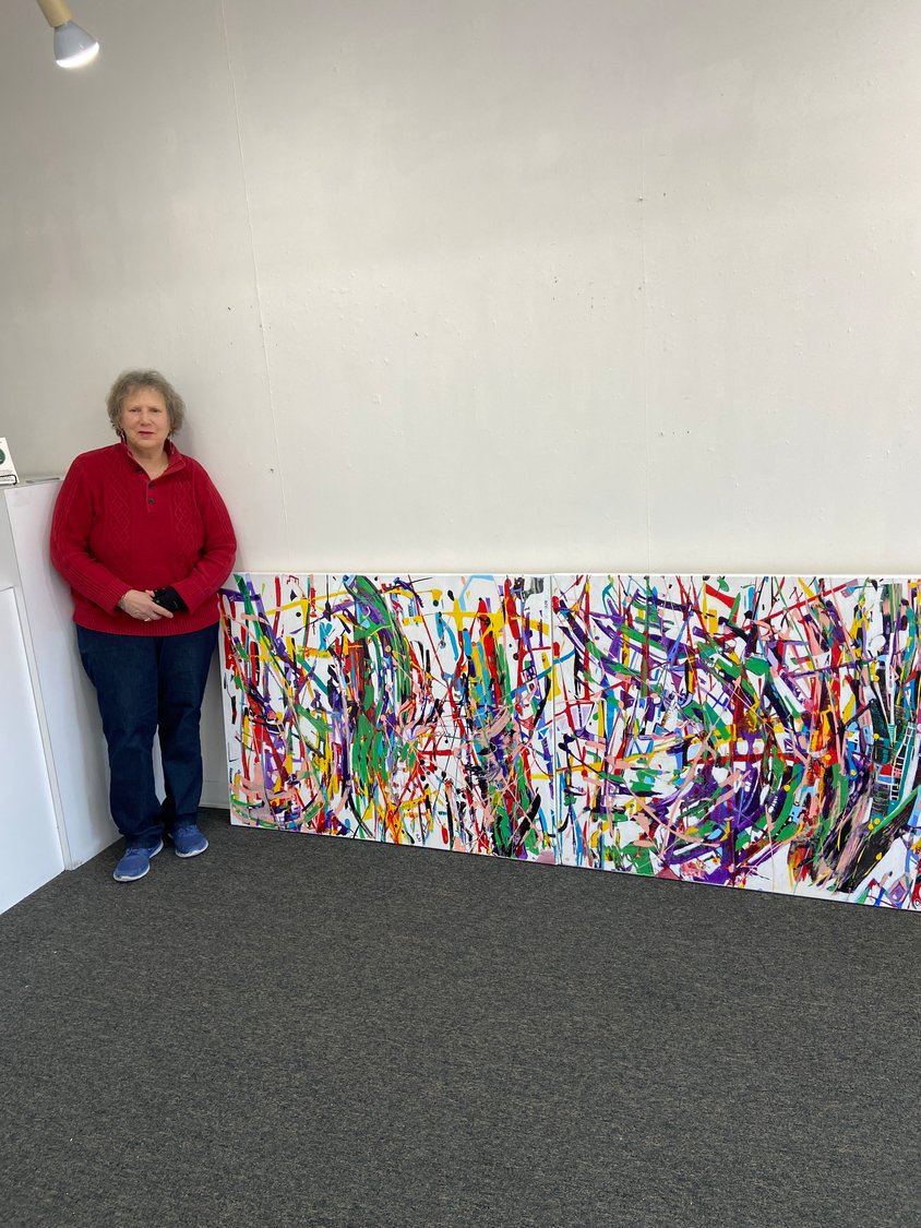 Karen Kirshner is preparing for two upcoming solo shows, and this painting, titled “Faces in the Crowd,” is the biggest one she has done.