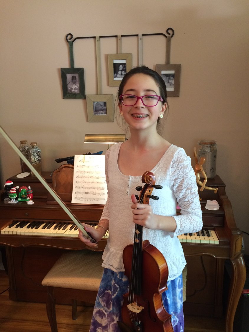 Elizabeth Wingert started playing the violin at age five, taught by her mother, Maria